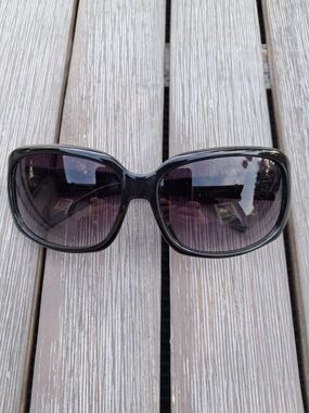 Michael Kors Berley Black Sunglasses with Gray Gradient Lenses.